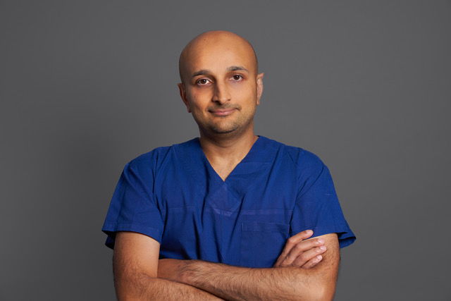Dr Varun Harish Sydney Plastic Surgeon - in scrubs