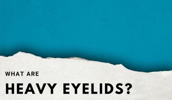 What are heavy eyelids